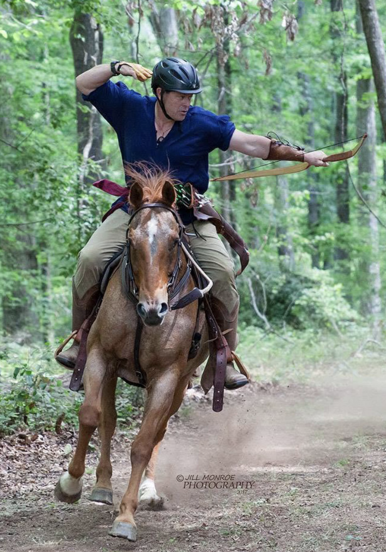 Trey Schlichting of Mystic Pines Archery with his horse