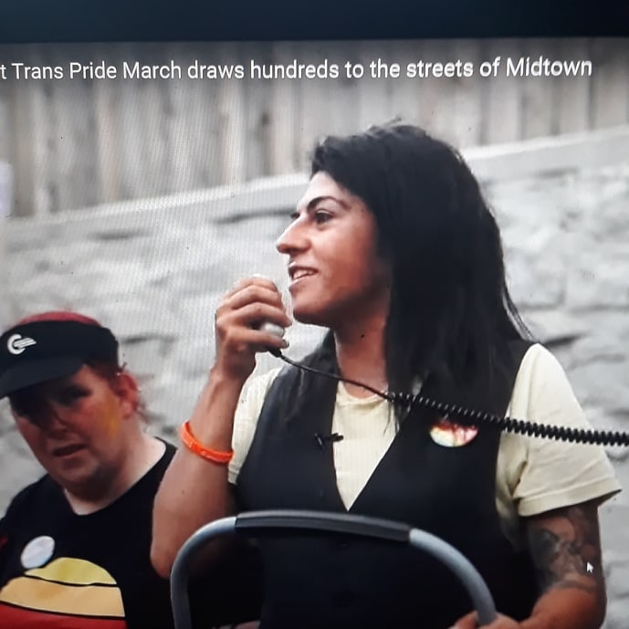 Niña Terca speaking at a Trans Pride March